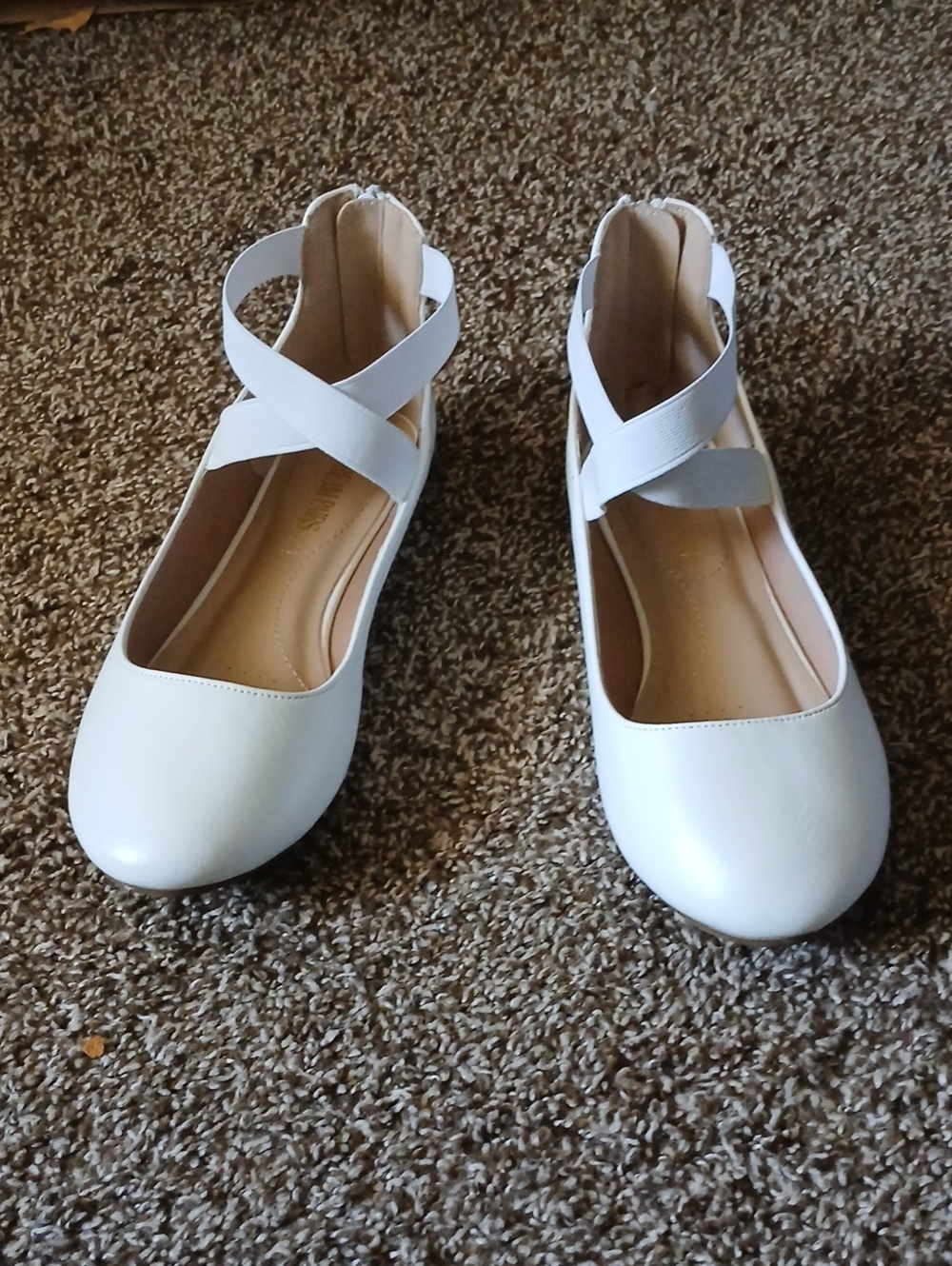 White ballet flats with ankle straps